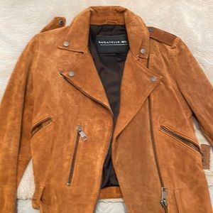 Brown leather jacket, buckle and zipper details